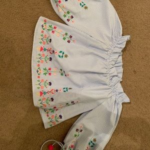 Over-the shoulder embroidered top